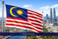 علم ماليزيا أمام أفق مدينة كوالالمبور في إشارة إلى منحة ماليزيا الدولية MIS للطلاب الدوليين