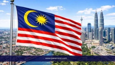 علم ماليزيا أمام أفق مدينة كوالالمبور في إشارة إلى منحة ماليزيا الدولية MIS للطلاب الدوليين