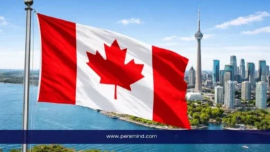 علم كندا أمام أفق مدينة تورونتو في إشارة إلى الدراسة في كندا بدون IELTS للطلاب الدوليين