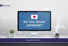 شاشة كمبيوتر تعرض العلم الياباني مع عبارة "Do you speak Japanese?"، صورة تعبر عن اختبار NAT الياباني لقياس مستوى اللغة.