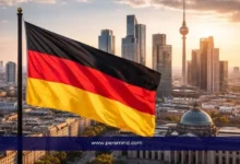 علم ألمانيا مع أفق مدينة برلين – فرصة الدراسة في ألمانيا بدون شهادة IELTS في الجامعات الألمانية