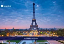 صورة لبرج إيفل في باريس خلال الغروب ضمن مشهد حضري هادئ – تدريب الإنتربول في فرنسا 2026.