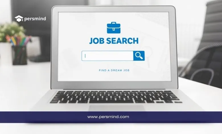 حاسوب محمول يعرض صفحة بحث عن الوظائف تحت عنوان Job Search في بيئة مكتبية.
