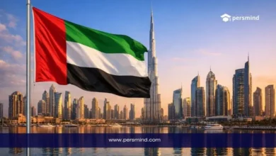 علم الإمارات أمام أفق دبي وبرج خليفة يرمز إلى الدراسة في الإمارات للطلاب الدوليين