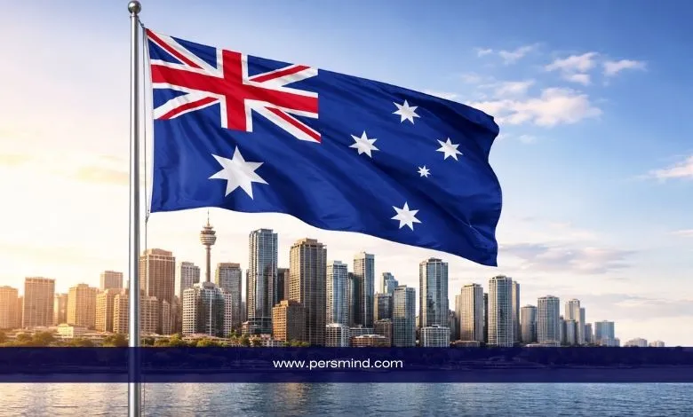 علم أستراليا يرفرف أمام أبراج مدينة سيدني في أستراليا – صورة توضيحية لمقال منحة جامعة سيدني للطلاب الدوليين.