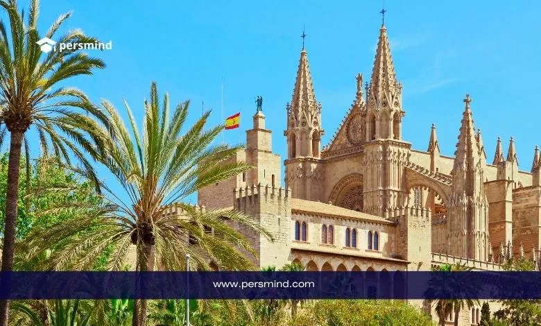 Historic cathedral in Spain with palm trees representing University of La Rioja Scholarship 2026 and study opportunities in Spain