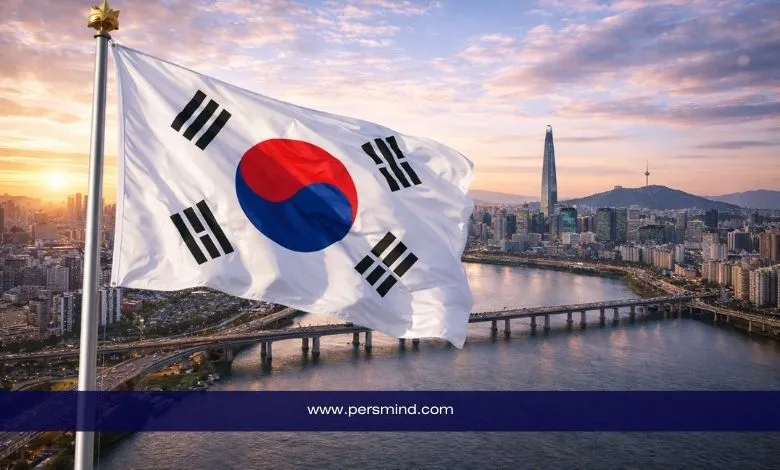 علم كوريا الجنوبية يرفرف فوق مدينة سيول مع إطلالة على نهر الهان وبرج لوتيه – صورة توضيحية لمقال برنامج التدريب الداخلي GCF الممول بالكامل.