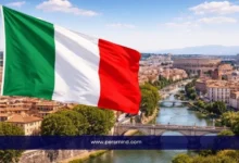 علم إيطاليا يرفرف أمام معالم مدينة روما ونهر التيبر ضمن مقال عن برنامج التدريب الداخلي للصندوق الدولي للتنمية الزراعية