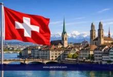 علم سويسرا أمام مدينة زيورخ في إشارة إلى برنامج الطلاب الصيفي السويسري للطلاب الدوليين