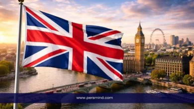 علم المملكة المتحدة يرفرف أمام نهر التايمز في لندن مع ظهور ساعة بيغ بن وعجلة لندن في الخلفية – صورة توضيحية لمقال قمة السلام في لندن.