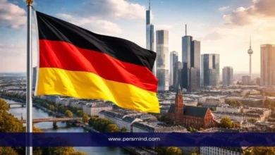 علم ألمانيا أمام أفق مدينة ألمانية حديثة في إشارة إلى منحة DAAD EPOS MIDE للدراسة في ألمانيا