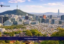 مشهد بانورامي لمدينة آسيوية حديثة ضمن مقال عن ورشة عمل اليونسكو للقيادة الشبابية وفرص المشاركة الدولية