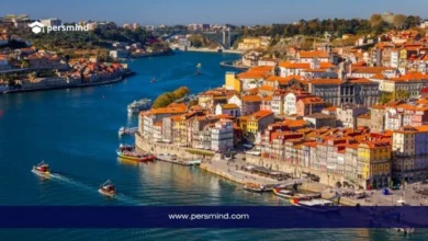 صورة لواجهة مائية ومدينة ساحلية جميلة في البرتغال، تعبر عن فرصة التطوع في البرتغال