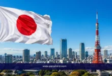 برنامج JAXA Internship FY في اليابان مع علم اليابان وأفق مدينة طوكيو