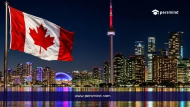 برنامج التبادل الثقافي في نياجرا مع علم كندا وأفق مدينة تورنتو ليلاً